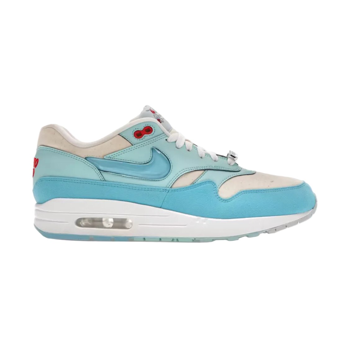 A light blue and beige Nike Air Max sneaker with red accents, shown in a side profile on a white background.