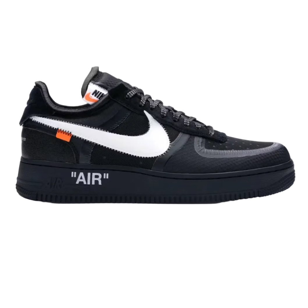 A black Nike Air Force 1 Low sneaker with a white Swoosh, featuring 'AIR' printed in white on the black midsole and a small orange accent tab near the collar.