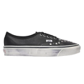 A black leather Vans platform sneaker with silver studs on the toe box, shown in a side profile against a light gray background.